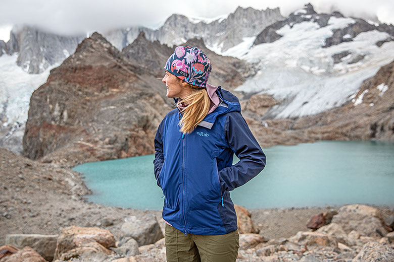 Rab Kinetic Alpine 2.0 jacket (standing in front of lake)